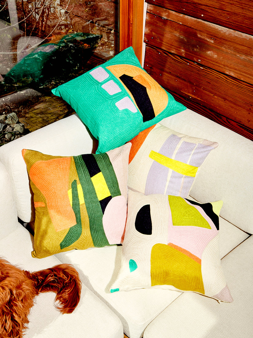 Delighted Abstract Pillows by Cold Picnic in a pile.