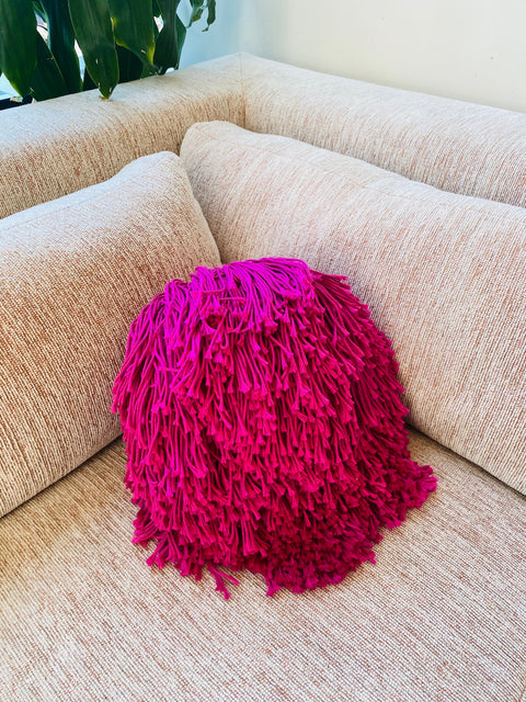 Magenta Crochet Pillow by Huldra of Norway.