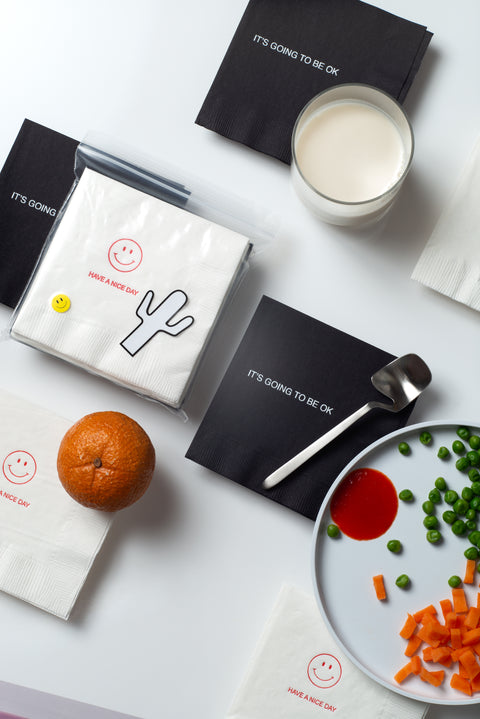 Cocktail Napkins by Pon in and out of packaging.