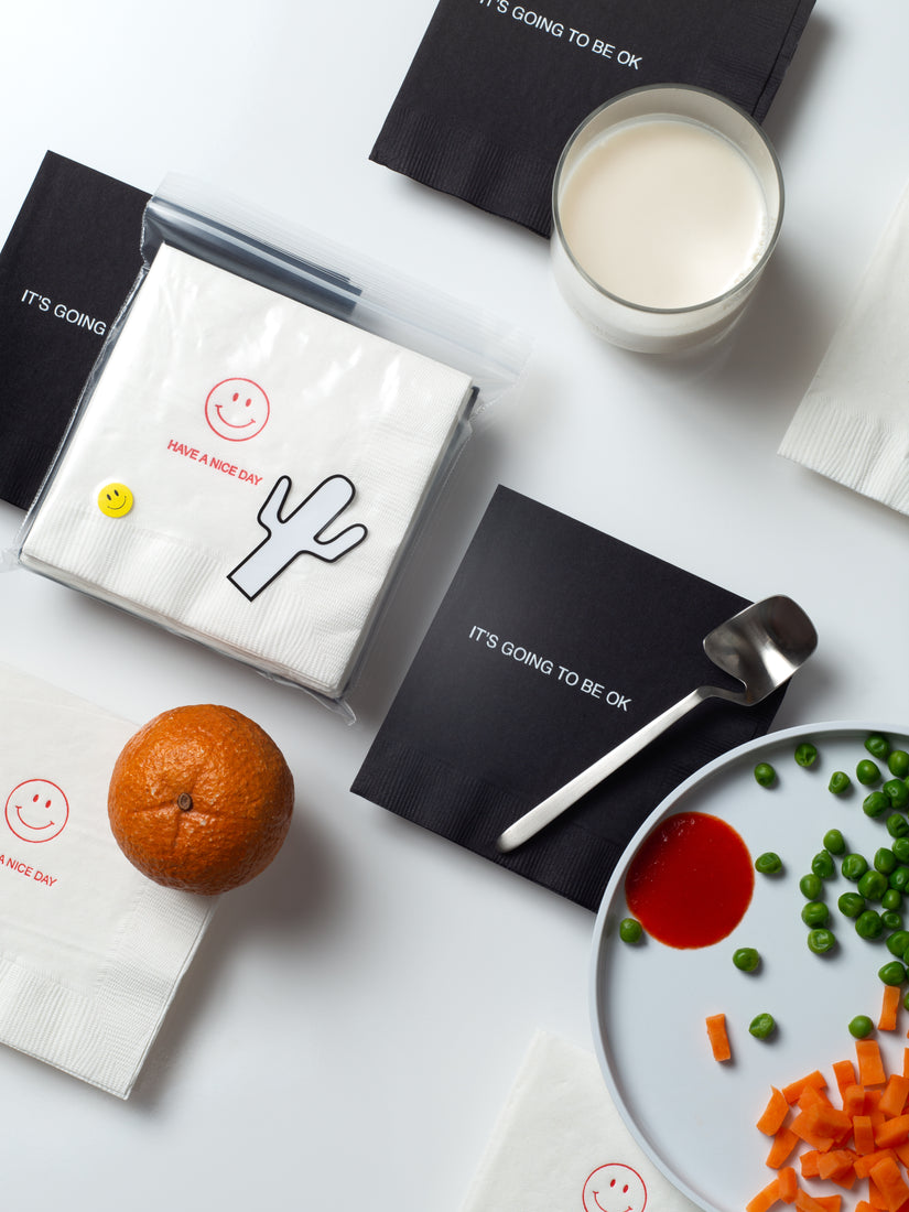Cocktail Napkins by Pon in and out of packaging.