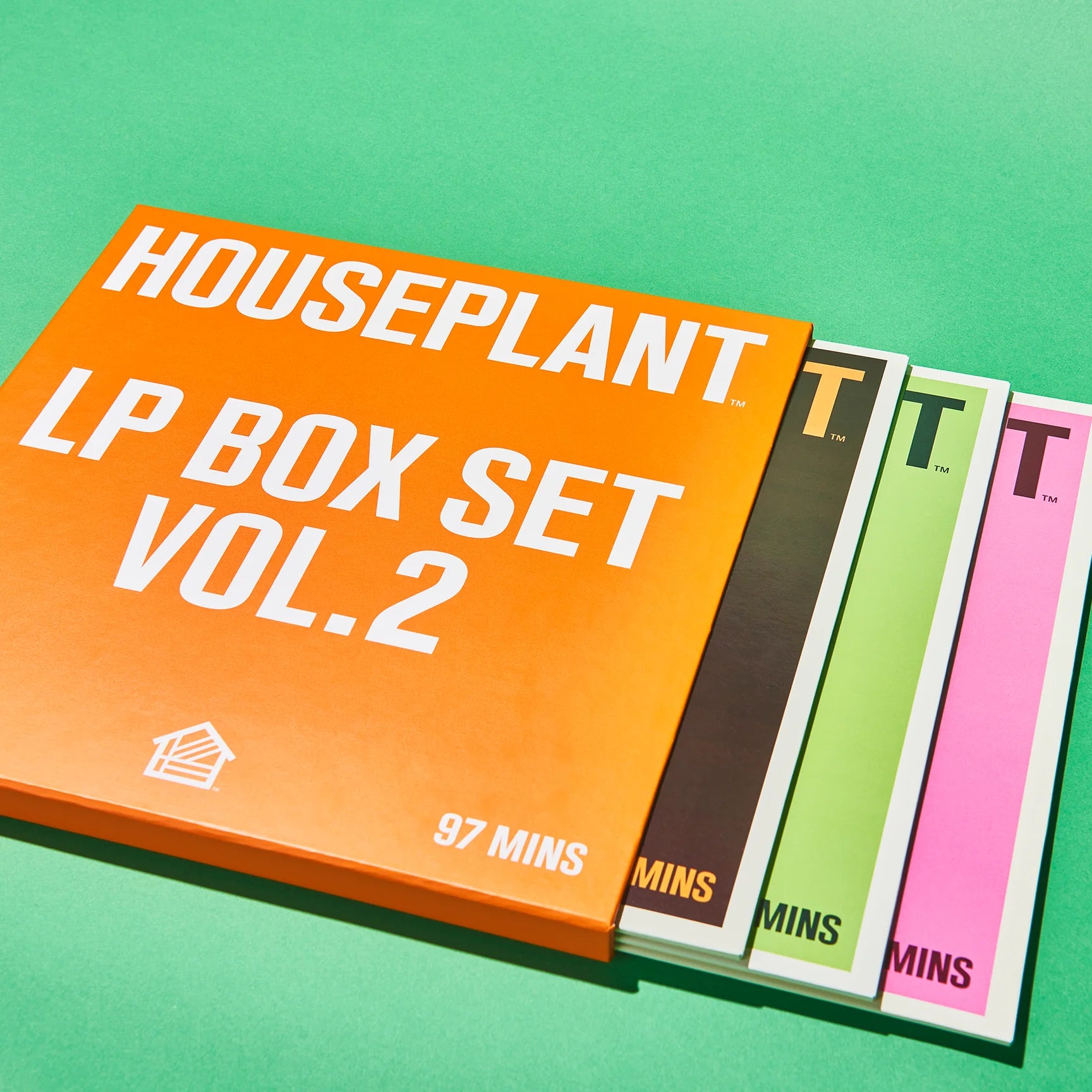 The Houseplant Vinyl Box Set Vol 2 with it's three vinyl sleeves pulled out at different lengths to highlight each covers different color.