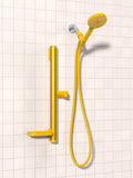 A yellow Minimalist Shower Head by Sproos.